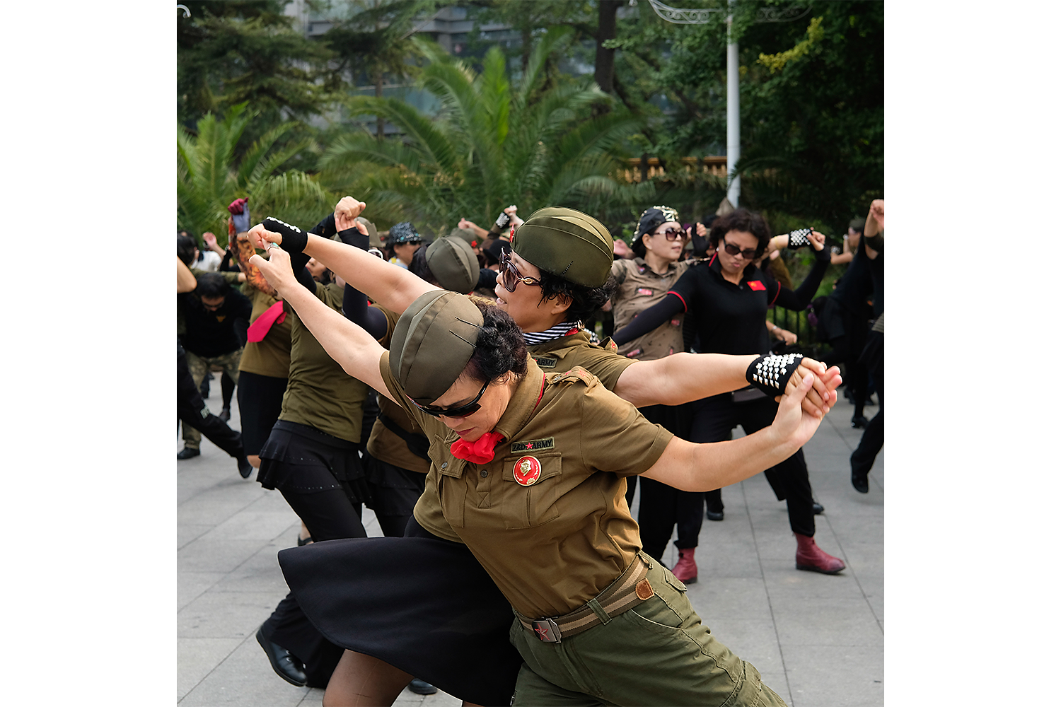 In Beijing’s Taoranting Park, a group dressed in Maoist costumes dances a version of the jitterbug. Photo by Liu Bowen @lbwsmail
