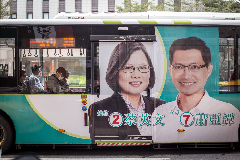 Political advertisements appear everywhere during election season. Here, a bus in Taipei displays Tsai Ying-wen endorsing parliamentary candidate Xiao Ya-tan.