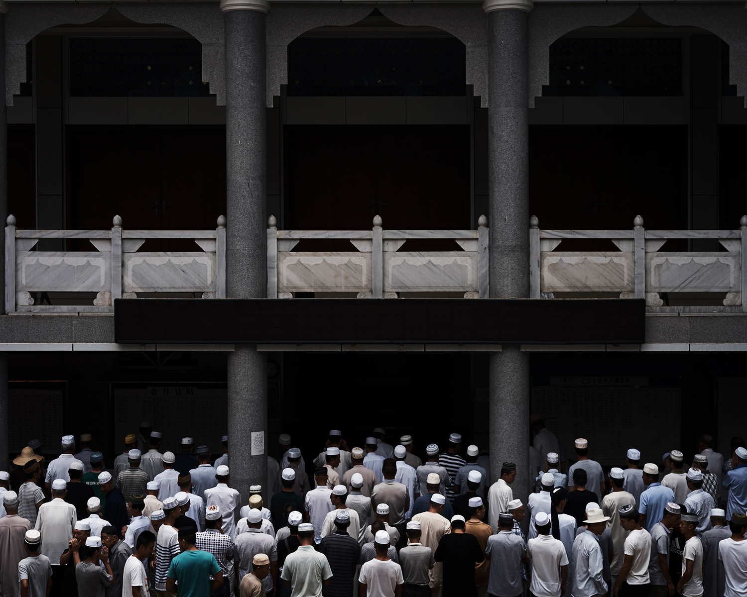 Congregants attend a funeral at Nanguan Mosque, June 2016. 