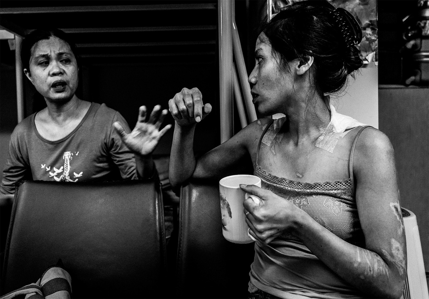Shirley Dalisay and Marisa, residents of Bethune House, catch up on their daily activities. Both women came to Hong Kong from the Philippines. Here, residents support each other emotionally, socially, and sometimes even financially, when they can. According to Antonio, most of Hong Kong’s approximately 330,000 foreign domestic workers come from the Philippines and Indonesia, half are married, and most are on-call 24 hours a day.
