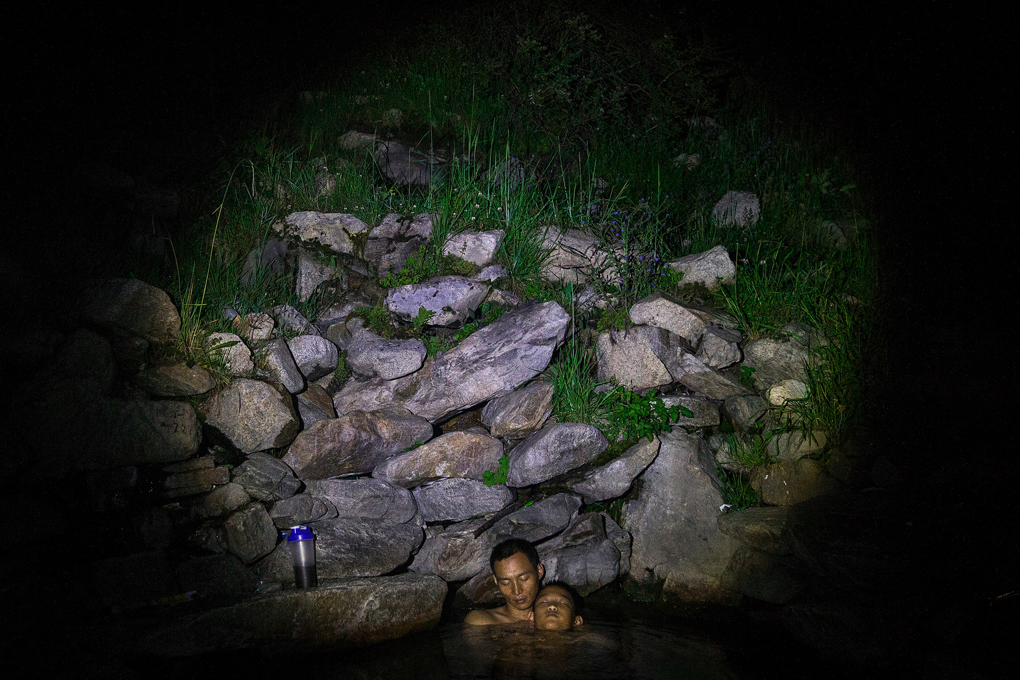 There are also relaxing moments on the trip. One evening, Chao and Runxi find a natural hot spring where they take a bath, in Zheduotang, Garze, Sichuan, July 18.