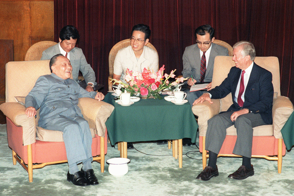 China’s paramount leader Deng Xiaoping confers with U.S. President Jimmy Carter, June 29, 1987 in Beijing, after signing an agreement between China and the Carter Center’s Global 2000 program. Carter won the 2002 Nobel Peace Prize for “his decades of untiring effort to find peaceful solutions to international conflicts.” (Photo by John Giannini/AFP/Getty Images)