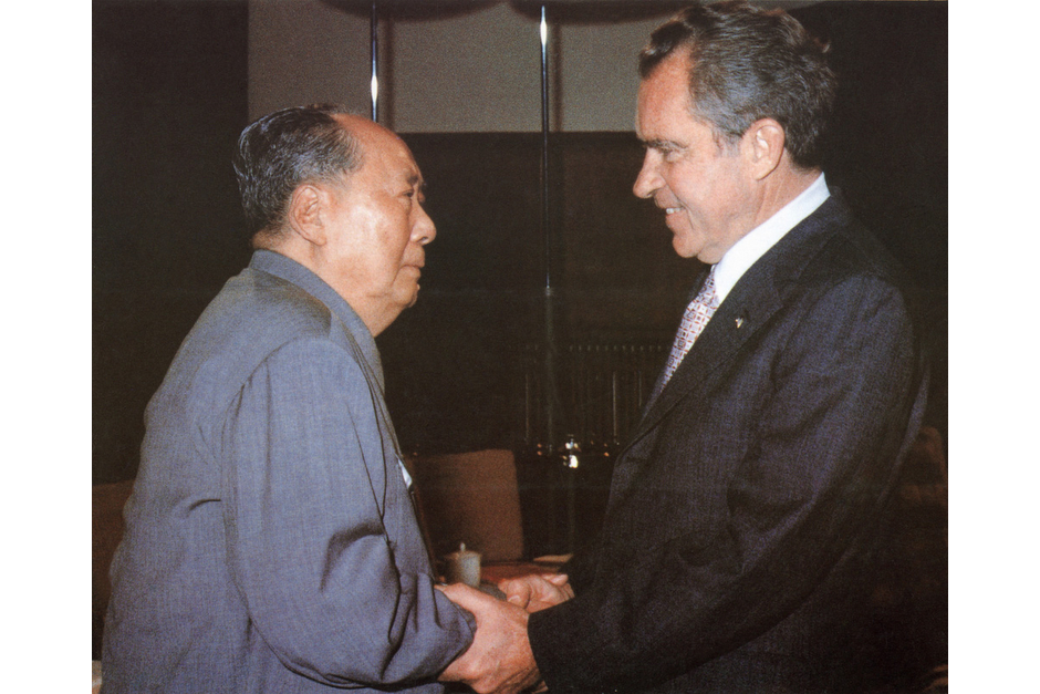 Mao Zedong welcomes U.S. President Richard Nixon, in Beijing in February of 1972, for the first visit of a sitting U.S. President to China. The historic visit, brokered after more than a year of delicate negotiations to begin to restore relations between the two countries, took place against the backdrop of the Cultural Revolution. Their meetings were filmed, and a ten minute segment was broadcast on Chinese national television. (AFP/Getty Images photo)