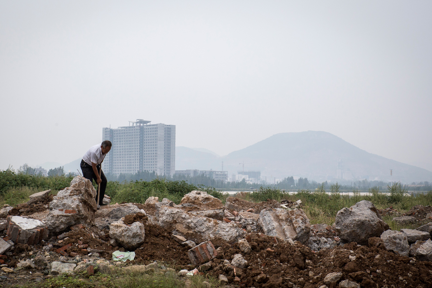 A view of Xichuan. Hundreds of local mines were also ordered to close by the central government, an accountant from Zhengzhou said, to prevent pollution from leaching into water bound for Beijing.