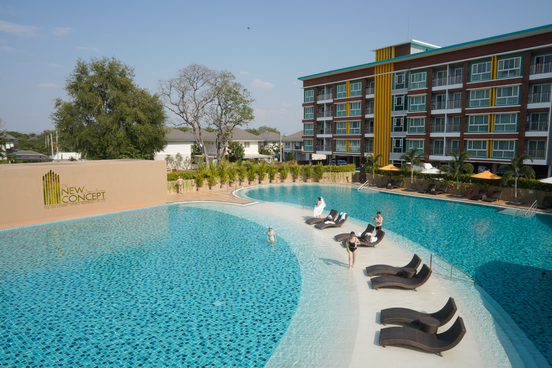 Chinese tourists swim at a hotel-style apartment complex in Chiang Mai, January 18, 2019. Besides pursuing an education in the country, a growing number of Chinese are going to Thailand for travel and to purchase real estate. Thai law limits foreign ownership to 49 percent of the units in a given condominium complex. 30 percent of the apartments in the complex pictured are owned by Chinese citizens, according to An Lan, who owns three units in it.  